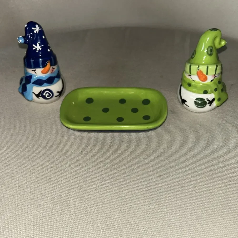 Three piece snowman salt and pepper shakers